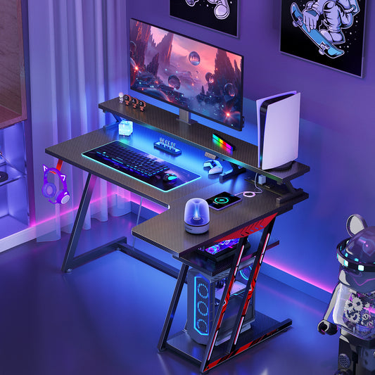 39 Inch Gaming Desk L Shaped with Storage Shelf & Power Outlets, Small Corner Computer Desk with Monitor Shelf, L Shaped Desk with Carbon Fiber Surface, Gamer Desk Gaming Table, Pure Black